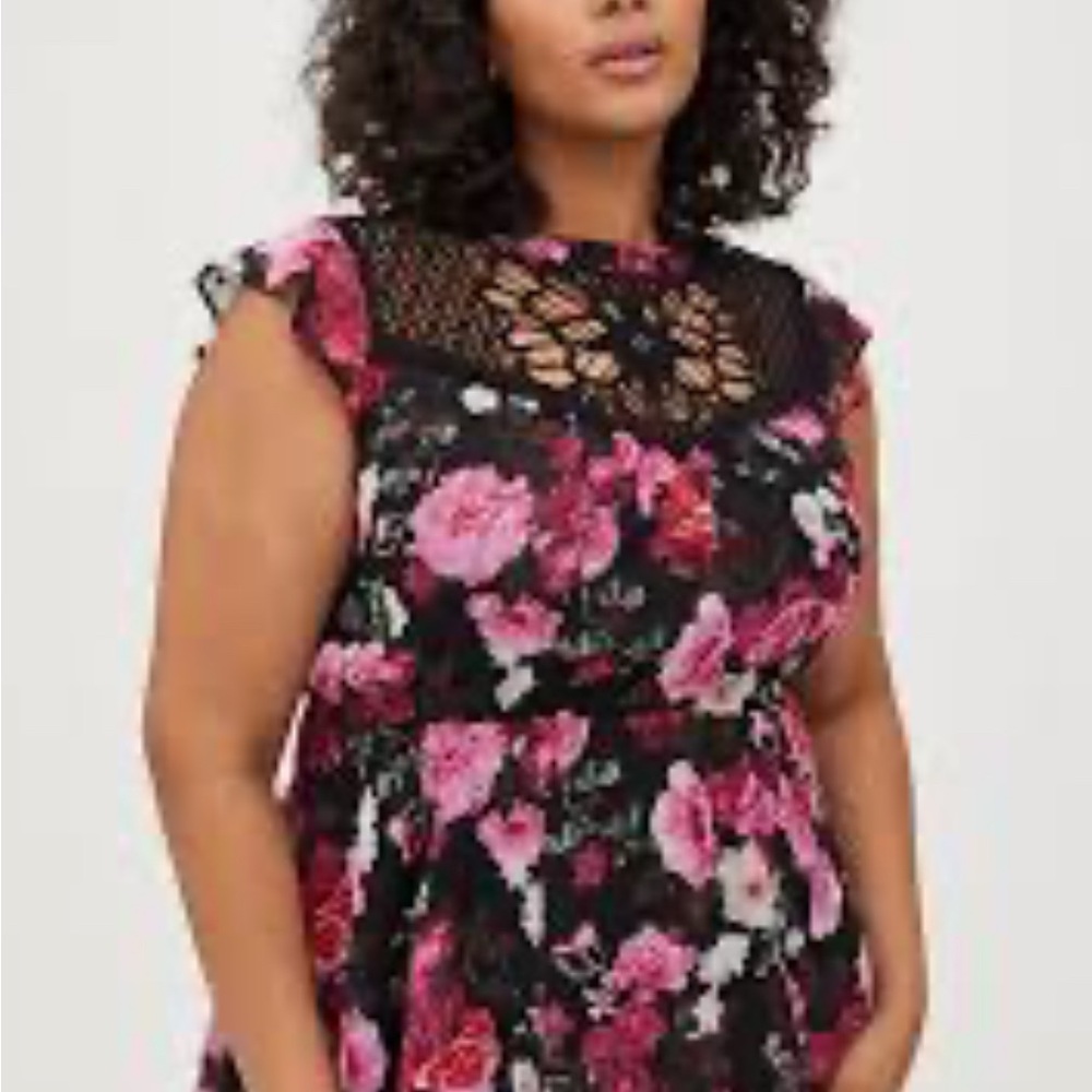 Torrid floral Peplum tunic top size 4